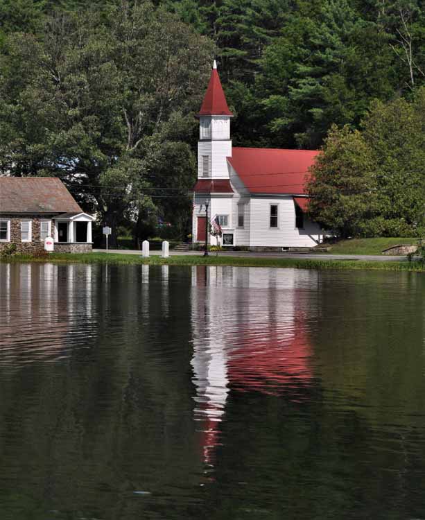 church reflected on lake